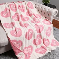 a blanket that has hearts on it