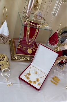 an assortment of gold jewelry on display