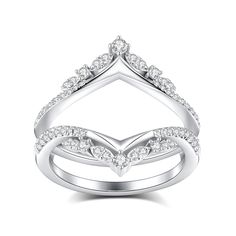 a white gold ring with diamonds on the sides and an open triangle design in the middle