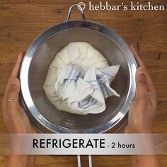 a person holding a metal strainer on top of a wooden table with the words refrigerate 2 hours