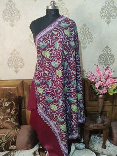 Indian Spring Shawl, Kashmiri Shawl, Kashmiri Wrap An exquisite Kashmiri Shawl With All Over Chinar-Floral Embroidery, This Kashmiri Shawl Is Customisable as per the colour and size of your Preference   Embroidery              Floral Aari Work Length / Breadth     200cm / 100 cms ( Customisable)  Fabric                     Pure Wool Colour                     Maroon ( Customisable)  Returnable          Yes Free Shipping            Yes * If you want this shawl in any other base colour, Please dro Traditional Multicolor Handwork Dupatta, Embroidered Red Pashmina Shawl In Jamawar, Multicolor Pashmina Traditional Wedding Wear, Red Pashmina Dupatta With Resham Embroidery, Traditional Silk Dupatta With Handwork, Red Bohemian Dupatta With Handwork, Red Pashmina Shawl With Motifs In Traditional Drape, Red Pashmina Shawl With Motifs, Red Pashmina Shawl With Motifs And Traditional Drape