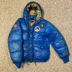 Super Rare Size Small Polo Raph Lauren Mountain Expedition Patch Yosemite Ski Rescue Patrol Puffer Jacket In Used Condition. A Combination Of Interesting Colors, Patches, And Leather Accents. These Jackets Are Few And Far Between, Hard To Find Nearly Anywhere On The Internet. Flaws Are Pictured (Slight Fading/Discoloration On Shoulders And Sleeves). Make Me An Offer. Fitted Blue Outerwear For Outdoor, Retro Blue Nylon Outerwear, Blue Nylon Patchwork Outerwear, Retro Fitted Blue Outerwear, Fitted Retro Blue Outerwear, Blue Fitted Retro Outerwear, Raph Lauren, Ski Patrol, Leather Accents