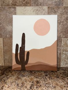 a painting of a cactus on a tile wall