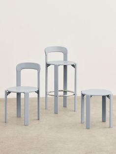 three chairs and two stools are shown in the same color as they appear to be made out of plastic