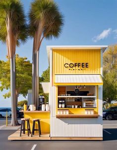 a small coffee shop with two stools next to it and palm trees in the background