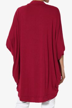 Oversized Comfortable V-neck Top, Comfortable Oversized Soft Knit Tops, Cozy Batwing Sleeve Top, Oversized Solid Color Cardigan For Loungewear, Oversized Red Solid Color Tops, Oversized Loungewear Cardigan, Oversized Solid Red Tops, Oversized Crew Neck Cardigan For Loungewear, Oversized Soft Knit Versatile Tops