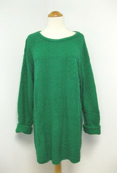 A beautiful true vintage rich green color 100% cotton sweater, tagged women's size M. This gem of a sweater has texture and is a medium weight, not bulky. The sweater  is long and oversized, and could fit a size small, medium or large depending on how oversized you like your sweaters. It's soft and in fantastic condition! **PLEASE Note, the black cinch belt is NOT included. I just wanted to show how nice this sweater will look belted with the sleeves rolled up! **  ** Label: Sweet Oversized Green Long Sleeve Sweater, Vintage Green Oversized Sweater, Green Knitted Sweater Dress For Winter, Casual Green Sweater Dress For Winter, Green Knitted Sweater Dress For Fall, Green Knit Sweater Dress For Winter, Vintage Green Knit Sweater, Oversized Green Sweater For Winter, Oversized Green Sweater For Fall