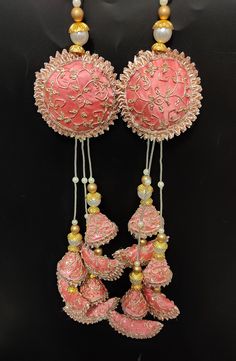 "15\" beautiful pink silk fabric zardosi jaal embroider decorative hanging tassel for tradtional indian wedding lehnga saree blouse Handmade Hanging/tassels Material:Silk, Thread, Motifs Package Contents: 4 Key Features: Embroidery art work This is good match with both Indian and western outfits and are superb for wedding and festive parties. This would be best complement to your designer saree, lenhga or any other kind of dress. This is the combination of traditional and modern embroidery work. Chaniya Latkan Designs, Latkans For Lehenga Handmade, Textiles Moodboard, Fabric Latkan, Pink Silk Fabric, Blouse Hangings, Latkan Design, Tassels Fashion Clothing, Tassels Designs