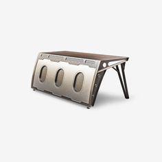 a metal and wood bench with four holes on it's sides, against a white background