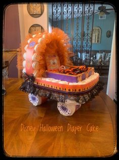 a cake shaped like a lion on top of a wooden table with decorations around it