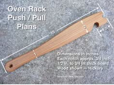 a wooden rack with measurements for the back and side of it, sitting on top of a concrete surface