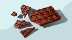 three pieces of chocolate sitting on top of each other