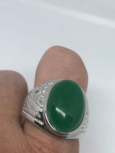 Large green nephrite jade Ornate German Silver Vintage ring, does not tarnish, NOT sterling Sizes 9, 10 and 11 All rings are shipped in a nice gift box. Check out our over a THOUSAND great reviews Engraving is $4 per letter and is not always perfect depending on the piece. It can take a few days if the jeweler is busy. This is payable to Paypal Judithsltd@gmail.com Green Rings With Polished Finish As Gift, Green Jade Ring As A Gift, Green Polished Finish Rings For Gift, Green Polished Finish Rings As Gift, Green Jade Ring For Gift, Green Jade Ring Suitable For Gift, Classic Green Jade Rings, Classic Silver Ring With Jade, Classic Silver Jade Ring