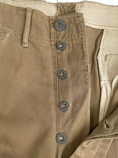 Vintage 1940s Wwii Us Army Chino Pants Metal Button Fly Size 33x28 - Etsy Indonesia Khaki Cotton Cargo Pants With Button Closure, Khaki Bottoms With Buttons, Vintage Cotton Bottoms With Buttons, Khaki Straight Leg Pants With Buttons, Vintage Workwear Pants With Buttons, Vintage Pants With Buttons For Workwear, Vintage Khaki Work Pants, Vintage Cargo Pants With Belt Loops In Khaki, Vintage Khaki Cargo Pants With Belt Loops