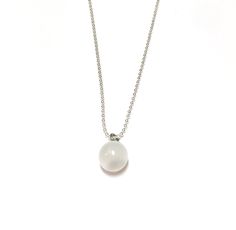 A simple drop necklace featuring a white moonglow pendant in a round bead shape. Check out the pic of the model wearing the necklace to give you an idea of the scale and size (shown in a different color/shape). Pendant measures about 8mm. Chain is made with sterling plating & measures 16" with an added 2" extender so it adjusts to 18". Most all earrings are made with vintage lucite parts that were made in Rhode Island in the 1960's - early 80's by Best Plastics or in NYC for Kim Crafstmen. W Simple White Round Pendant Necklace, Simple White Pendant Necklace, Modern White Teardrop Necklace, Surgical Steel Earrings, Ball Chain Necklace, Moon Glow, Charm Pendant Necklace, Vintage Lucite, Color Shapes