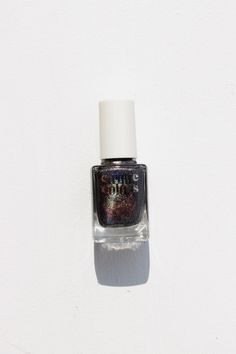 Alter Ego from Cirque Color. A cosmic black holographic nail polish. Notes: Holographic polishes look best under direct light, such as sunlight or strong indoor bulbs, to bring out the prismatic rainbow effect. Opaque in 2-3 coats Non-Toxic, 10-Free Formula Vegan and Cruelty Free Ingredients Butyl Acetate, Ethyl Acetate, Nitrocellulose, Adipic Acid / Neopentyl Glycol / Trimellitic Anhydride Copolymer, Acetyl Tributyl Citrate, Isopropyl Alcohol, Acrylates Copolymer, Stearalkonium Bentonite, N-But Black Holographic, Holographic Nail Polish, Isopropyl Alcohol, Holographic Nails, Alter Ego, Cruelty Free, Nail Colors, Clothes For Sale, Nail Polish