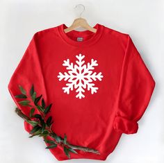 "Snowflake Sweatshirt, Christmas Sweater, Winter Sweatshirt, Snowflake Hoodie, Snow Sweater, Cute Snow Pocket Shirt, Christmas Family Sweater ☀️☀️☀️☀️☀️ Everything in our shop is hand crafted and made to order. If you want different color or size contact me! If you would like something custom made to fit your personal style please message me and I will do everything to get you that something special. ---How To Order--- ⭐️Please, check and review all photos ⭐️Choose your t-shirt size and color ⭐️ Cozy Winter Holiday Sweatshirt, Red Winter Sweatshirt, Winter Holiday Sweatshirt, Red Holiday Sweatshirt For Winter, Winter Gift Hooded Sweatshirt, Hooded Winter Sweatshirt Gift, Red Winter Sweatshirt As Gift, Casual Winter Hoodie For Holidays, Casual Winter Holiday Hoodie