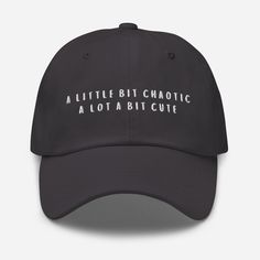 A Little Bit Chaotic, A Lot A Bit Cute - Dad hat, Chaos Cap, Chaotic Hat, Slogan Cap Hat, 90's Cap, Gift for Girlfriend, Gift for Bestfriend, embroidered hat Dad hats aren't just for dads. This one's got a low profile with an adjustable strap and curved visor. * 100% chino cotton twill * Green Camo color is 35% chino cotton twill, 65% polyester * Unstructured, 6-panel, low-profile * 6 embroidered eyelets * 3 ⅛" (7.6 cm) crown * Adjustable strap with antique buckle * Blank product sourced from Vi Funny One-size Dad Hat Baseball Cap, Funny Dad Baseball Cap, Funny Hats For Streetwear, One Size Fits Most, Funny One-size Streetwear Hats, Novelty Cap For Streetwear, Funny Streetwear Hats One Size, Funny Streetwear Hats, Novelty Streetwear Hat With Curved Brim, Funny Hats With Letter Print And Curved Brim