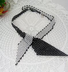 "Necklace-scarf \"Business Lady\". Classic black and white colors. Beaded tie tied bow. Beaded jewelry A gift for her Black necklace Delicate handmade jewelry Necklace made of Czech beads. Necklace circle 55 cm or 21,65 inches. If you need another color or length, email me. If you have any questions, email me. Thank you for your interest in my work." Black Jewelry With Ties For Gifts, Black Ties Jewelry For Gift, Gift Black Jewelry With Ties, Elegant Black Necklace With Bow, Handmade White Beaded Necklace For Formal Occasions, Beaded Tie, Business Lady, Necklace Scarf, Beaded Scarf