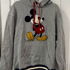 New Hoodie Mickey Mouse . Size Small, Lenght 26” X 21” Aprox Unisex Mickey Mouse Sweatshirt For Winter Streetwear, Disney Cotton Sweatshirt For Winter, Winter Disney Cotton Sweatshirt, Fall Mickey Mouse Sweatshirt For Streetwear, Casual Long Sleeve Mickey Mouse Sweatshirt, Mickey Mouse Long Sleeve Sweatshirt For Streetwear, Casual Mickey Mouse Sweatshirt For Winter, Disney Cotton Hoodie Sweatshirt, Disney Cotton Hoodie For Streetwear