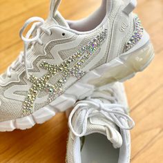 These Are A Size 8.5 White Asic Running Shoes I Put Rhinestones On, I Sell Them On Et Sy As Well (Bug Boutique If You Want To Check It Out) The Rhinestones Are On There Extremely Well. I Have Been Making Sandals And Sneakers With The Same Glue And Beads For Years And They Don’t Come Off Message Me For Any Questions Casual Low-top Sneakers With Rhinestones, Sporty High-top Sneakers With Rhinestones, Sporty Low-top Sneakers With Rhinestones, Sporty Low-top Rhinestone Sneakers, White Synthetic Sneakers With Bling, White Iced Out Sneakers For Streetwear, White Embellished Sneakers For Streetwear, White Rhinestone Round Toe Sneakers, White Embellished Lace-up Sneakers