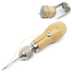 a pair of sewing tools are shown on a white background, one is made from wood and the other is metal