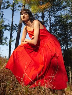 A fit-and-flare sundress with noodle straps, empire yoke and a gently gathered skirt. No lining Womens Red Dress, Noodle Strap, Indian Handloom, Wild Eyes, Christmas Party Outfit, Sustainable Clothing Brands, Red Dress Women, Sleeveless Midi Dress, Red Midi Dress