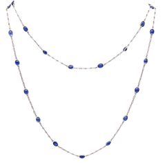 Art-Deco Sapphires Stations Chain Necklace Sautoir. This Is A Gorgeous Stations Long Sautoir, Created In America During The Art-Deco Period, Back In The 1930's. It Was Designed As A Chain Displaying Twenty-Eight Blue Sapphires Divided In Stations And Carefully Crafted In Solid .900/.999 Platinum. The Sautoir Is Fitted With A Security Lock And Can Be Used As A Single Or Double Row. It Is Decorated Between The Diamonds Stations, With Twisted Wired Elements. Sapphires: Mounted In Bezel Settings, With 28 Oval Cabochon Cut Of Translucent Blue Sapphires Weight: 10.95 Grams (7.05 Dwt). Length: 34 Inches, (86.36 Cm). Hallmarks: Unmarked, And Has Been Electronically Tested For Platin Elegant Blue Jewelry With Bezel Setting, Blue Diamond Cut Platinum Necklace, Elegant Single Strand Blue Jewelry, Formal Blue Cabochon Necklace, Elegant Blue Single Strand Jewelry, Blue Single Strand Formal Jewelry, Blue Single Strand Jewelry For Formal Occasions, Exquisite Blue Platinum Jewelry, Elegant Blue Cabochon Necklace