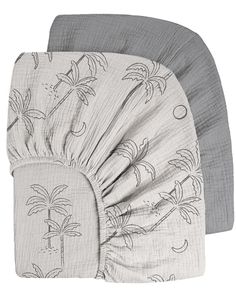 two baby swaddles with palm trees and moon prints on the sides, one in grey