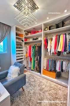 the closet is full of clothes and handbags