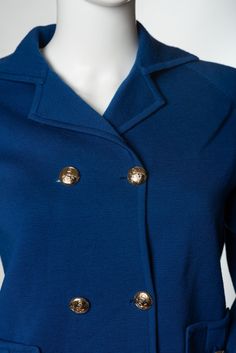 Fabulous button up royal blue cardigan jacket. The piece was made by Gino Paoli. The jacket has long sleeves, and two hip pockets. The buttons are gold with anchors on them. Tina the Mannequin feels so fabulous in this vintage piece! The buttons are so pretty, and the color is so rich! Tina thinks this piece will bring out your eyes, so you should absolutely get it. Tag: Gino Paoli Made in Italy Material: 100% Wool Stored in a smoke-free, pet-free environment Formal Long Sleeve Cardigan With Buttons, Gold Winter Blazer With Buttons, Gold Blazer With Buttons For Winter, Gold Blazer With Button Closure For Winter, Gold Buttoned Outerwear For Winter, Gold Buttoned Outerwear For Work, Classic Gold Long Sleeve Outerwear, Gold Long Sleeve Outerwear With Button Closure, Gold Winter Outerwear With Buttons