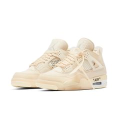 Three decades after its debut, the Air Jordan 4 gets a remake in the iconic Off-White style. Through a tasteful placement of leather, suede, mesh, and translucent materials, the "Sail" colorway is dressed in a warm cream color. Signature elements such as the zip tag and translucent heel tab further enhance the deconstructed aesthetic. Air Jordan 4 Off White, Jordan 4 Women, Jordan 4 Outfits, Jordan 4 Off White, Jordan Off White, Original Air Jordans, Jordan 4’s, Crocs Boots, Jordan Retro 4