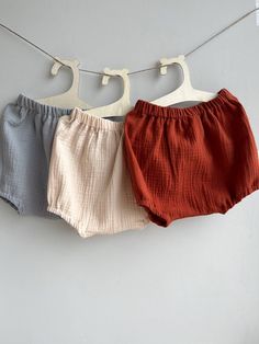 Introducing our adorable baby bloomers, designed to keep your little one comfortable and stylish during the all seasons.   Choose color from drop menu! Crafted with care, the diaper cover is made from high-quality organic cotton muslin, ensuring a soft and gentle touch against your baby's delicate skin. The breathable fabric provides excellent airflow, keeping your little princess cool and cozy on warm days. Versatile and practical, this baby shorts are available in sizes ranging from newborn to 2 years, ensuring the perfect fit as your little one grows. With twelve vibrant colors to choose from, you can select the ideal shade that suits your baby's personality or matches her existing wardrobe. Whether you're dressing up your little angel for a special occasion or simply enjoying a day out Summer Cotton Bloomers Short Style, Summer Cotton Short Bloomers, Playful Short Bloomers For Summer, Summer Cotton Diaper Cover With Ruffles, Summer Cotton Bloomers With Elastic Waistband, Playful Summer Short Bloomers, Cute Cotton Bloomers For Beach, Playful Summer Bloomers With Elastic Waistband, Cotton Ruffled Bloomers For Playwear