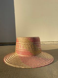 RESTOCKED JUST IN TIME FOR SPRING! Stand out in this unique, handmade straw hat featured in a structured style with a woven geometric design and striped detailing. Each slow crafted through an ancient process utilized by the Wayuu Tribe in Colombia, taking approximately 8 hours to hand make. All of the designs we offer honor the essence of the Wayuu Ethnicity. Crown: 11-12cm Brim: 8-9cm Style: Bucket hat with a flared, stiff rounded brim. Can be hand shaped as desired while wearing. Material: Na Style Bucket Hat, Straw Bucket Hat, Natural Weave, Natural Scents, Hand Shapes, Creative People, Weaving Techniques, Just In Time, Straw Hat