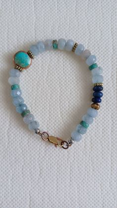 Sundance inspired bracelet with light blue chalcedony rondelles, turquoise,  Lapis and a cool bronze and copper lobster clasp! Disc Bracelet, A Bracelet, Blue Chalcedony, Lobster Clasp, Jewelry Bracelets, Light Blue, Beaded Bracelets, Copper, Turquoise