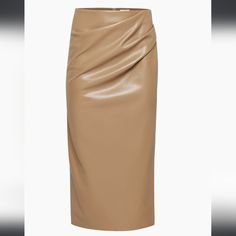 Wilfred Angie Maxi Skirt (Constant Camel) This Is A High-Waisted Wrap Skirt With A Thigh Slit And Gathering On The Side. It’s Made With Our Innovative Vegan Leather That Looks And Feels Like The Real Thing Rise: High Fit: Classic Follows Your Contours With A Little Room Length: Maxi Intended To Hit At The Shin Waist 24 In Hips 34 In Materials & Care Content: 100% Polyurethane; Interior: 100% Polyester Care: Machine Wash Grey Academia, Leather Maxi Skirt, Casual Maxi Skirt, Bohemian Maxi Skirt, Maxi Skirt Style, Midi Skirt With Pockets, Bohemian Maxi, Wrap Maxi Skirt, Pleated Maxi Skirt