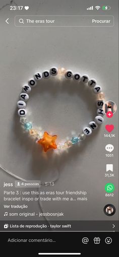 the beaded bracelet is decorated with words and stars