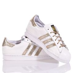 Adidas Superstar White Hive is the super glamorous custom women's sneaker. Entirely in white eco-leather with a geometric texture, featuring the iconic adidas stripes and a textured gold laminated back paired with round gold lurex laces. Adidas Superstar White Hive will also be provided with its original laces. Gold Sneakers With Foil Embossed Logo And Round Toe, Sporty Gold Sneakers With Perforations, White Leather Sneakers With Foil Embossed Logo, Gold Sneakers With Perforations, Gold Low-top Sneakers With Perforations, Geometric Texture, Zegna Shoes, Sneaker Wedge, Custom Shoes