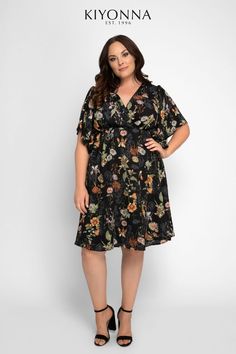 Flowy Floral Print Dress With Flutter Sleeves, Flowy Casual Dress With Flutter Sleeves, Spring Flutter Sleeve Flowy Midi Dress, Flowy Dresses With Ruffle Sleeves For Spring, Chic Floral Print Dress With Flutter Sleeves, Flowy Spring Dresses With Ruffle Sleeves, Chic Floral Print Dress With Butterfly Sleeves, Floral Print Dress With Flutter Sleeve And Flowy Skirt, Floral Print Dresses With Flutter Sleeves