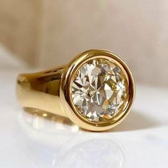 Hi, Welcome to our store, We Have focus on customizing any style of rings, we can customize the style what you like based on your pictures, everything is all handmade in our store. ❤ TITLE ❤ Solitaire Engagement Ring, Bezel Set Wedding Ring, 14K Yellow Gold Plated, 2.8 Ct Colorless Moissanite, Anniversary Promise Ring For Wife ❤ DIAMOND DETAILS ❤ → Shape: Round → Carat Weight: 2.8 Ct → Clarity: VVS1 → Color: D-E → Cut Grade: Excellent → Metal: 14K Yellow Gold Plated Available In 925 Sterling Sil Chunky Bezel Engagement Ring, Bezel Set Diamond Engagement Ring, Bezel Set Wedding Ring, Matching Couple Rings, Bezel Engagement Ring, Statement Rings Diamond, Moissanite Engagement Ring Solitaire, Bezel Set Ring, Ring Bezel