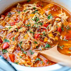 a white bowl filled with chicken tortilla soup