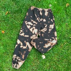 Tie dye Sweatpants, Black with Grey and Bronze tones. Each pair is one of a kind, ready to wear & the perfect addition to your wardrobe. Wear with matching sweatshirt (See listing for the set https://www.etsy.com/listing/874159986/tie-dye-sweatsuit-bleached-dye). Perfect to wear with Black T or Tank.  Bleached Dye Sweatpants // Lounge wear// Reverse Tie Dye  Tie-Dye makes everyone happy :) Each Design is made to order.  These Bleached Dye sweatpants are 8oz, 50% Cotton/50% Polyester and Super Co Acid Wash Relaxed Fit Pants For Fall, Fall Acid Wash Relaxed Fit Pants, Relaxed Fit Tie-dye Hand Dyed Bottoms, Tie Dye Washed Cotton Pants, Relaxed Fit Tie Dye Bottoms, Fall Bleached Relaxed Fit Bottoms, Fall Season Bleached Bottoms With Relaxed Fit, Fall Relaxed Fit Bleached Bottoms, Hand Dyed Tie Dye Cotton Bottoms