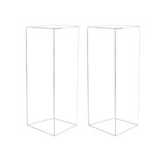 two tall glass vases sitting next to each other on a white background, one is empty