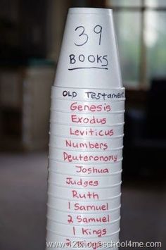 a stack of paper cups with the words 99 books written on them in different languages