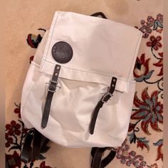 Barely Used Duluth Pack Scoutmaster Bag With Laptop Sleeve. White Leather Shoulder Bag For School, White Rectangular Canvas Bag With Leather Handles, White Canvas Shoulder Bag With Leather Handles, White Travel Canvas Bag With Removable Pouch, White Canvas Travel Bag With Removable Pouch, White Canvas Bag With Removable Pouch For Travel, Beige Backpack With Canvas Lining, White Tote Bag For Outdoor, White Leather Backpack With Adjustable Strap