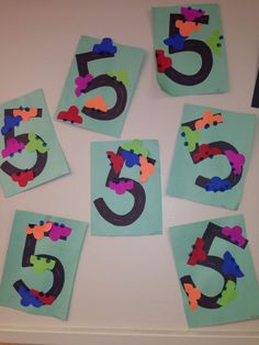 the number five is made out of construction paper