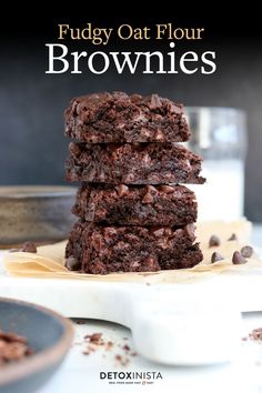 chocolate fudge oat flour brownies stacked on top of each other with the title overlay