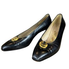 "Made in Italy, with a nice square toe tip.  Light scuffing to uppers, remedied with a polish.  The shoes are in great shape, super well constructed.  Leather insoles, leather soles and double \"O\" rings at vamp with the Ferragamo name." Classic Square Toe Heels For Business, Classic Heels For Galas, Classic Cap Toe Heels For Formal Occasions, Vintage Square Toe Heels For Formal Occasions, Classic Leather Shoes With Pointed Toe And Heel Tab, Classic Leather Shoes With Padded Heel, Classic Leather Shoes With Square Toe For Formal Occasions, Vintage Square Toe Heels For Work, Classic Slip-on Heels For Galas