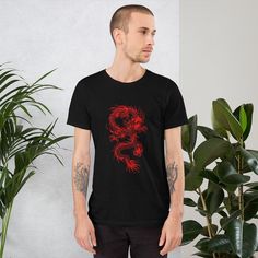 "Japanese Dragon Shirt | Red Dragon T-Shirt | Traditional Japan Dragon Art Drawing Tee | Aesthetic Grunge Clothing | Unisex T-Shirt A Japanese dragon, also known as ryū (ryu) or tatsu (龍 or 竜, \"dragon\") is a mythical animal from Japan. Like other creatures called dragons, the Ryū is a big, fantastic animal that looks similar to a serpent, and is related to the Chinese lóng and the Korean yong. You've now found the staple t-shirt of your wardrobe. It's made of a thicker, heavier cotton, but it' Red Graphic Crew Neck T-shirt, Red Graphic Design Crew Neck T-shirt, Red Crew Neck T-shirt With Graphic Design, Red Band Merch Shirt With Screen Print, Red Band Merch Cotton T-shirt, Red Cotton Band Merch T-shirt, Red Band Merch T-shirt For Streetwear, Red Short Sleeve Band Merch Top, Red Streetwear T-shirt With Front Print