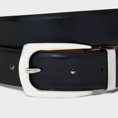 This Double Keeper Belt from A New Day™ in a solid black faux-leather finish gives any outfit an instant upgrade. It sports a lustrous silver-tone metal buckle with double keeper detail for a stylish look. The adjustable strap with multiple holes give a secure fit to all your outfits, and you can pair it with both casual or dressier ensembles for versatile styling. A New Day™: Style that goes wherever you do. Business Leather Strap Black Belt Buckles, Modern Black Belt With Silver Buckle, Adjustable Black Belt With Silver Buckle, Black Leather Belt With Buckle Closure, Black Leather Belt With Logo Hardware, Branded Belts, Belt Size, A New Day, Black Faux Leather